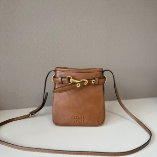 Miu Miu Mini lucky bag leather | Studio Nafay